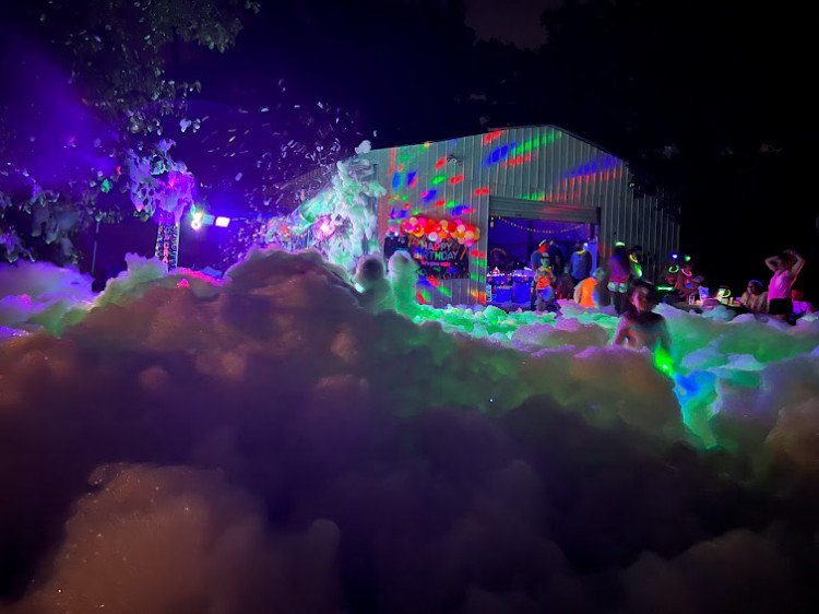 Foam Party UV Blacklight Glow Luna Moon Bounce and Party Rental Spring TX